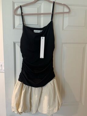 Missguided + Black & Cream Spaghetti Strap Bubble Hem Dress